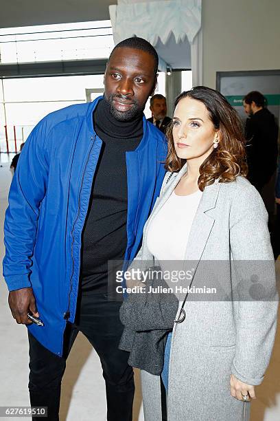 French actor Omar Sy and his wife Helene attend "Norm" Paris Premiere at Mk2 Bibliotheque on December 4, 2016 in Paris, France.