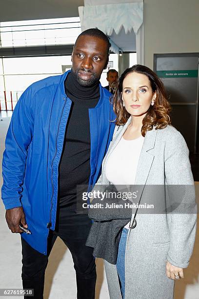 French actor Omar Sy and his wife Helene attend "Norm" Paris Premiere at Mk2 Bibliotheque on December 4, 2016 in Paris, France.