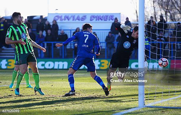 Adam Morgan of Curzon Ashton heads past goalkeper James Shea of AFC Wimbledon to score their second goal during the Emirates FA Cup second round...