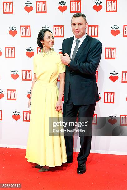 Former boxing champion Vitali Klitschko and his wife Natalia Klitschko attend the Ein Herz Fuer Kinder gala on December 3, 2016 in Berlin, Germany.