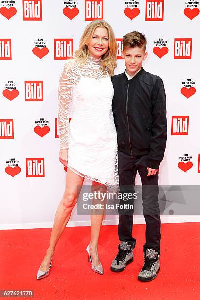 German actress Ursula Karven and her son Liam Taj Veres attend the Ein Herz Fuer Kinder gala on December 3, 2016 in Berlin, Germany.