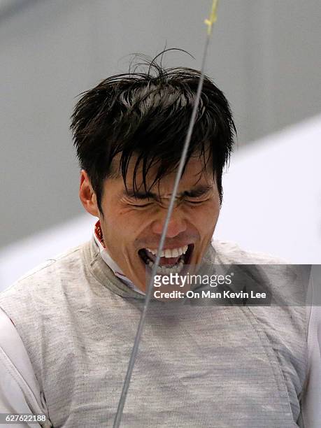 Cheung Sik Lui of Hong Kong reacts after defeating Choi Chun Yin Ryan of Hong Kong during Men's Foil final match in 2016 Hong Kong Fencing Open...