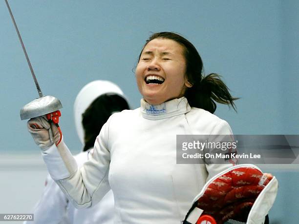 Chu Ka Mong of Hong Kong reacts after defeating Hsieh Kaylin Sin Yan of Hong Hong during Women's Epee final match in 2016 Hong Kong Fencing Open...
