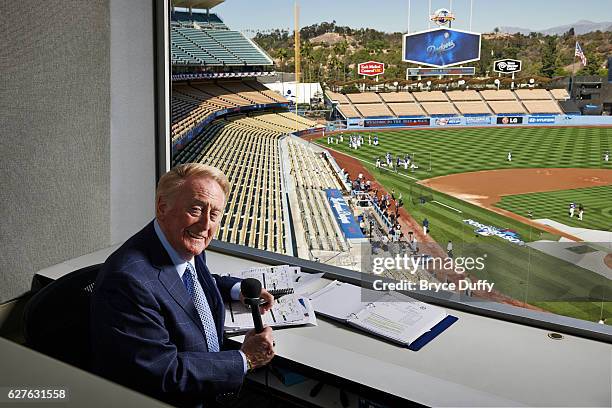 Sportscaster Vin Scully is photographed for People Magazine on October 15, 2013 in his booth at Dodgers Stadium in Los Angeles, California.