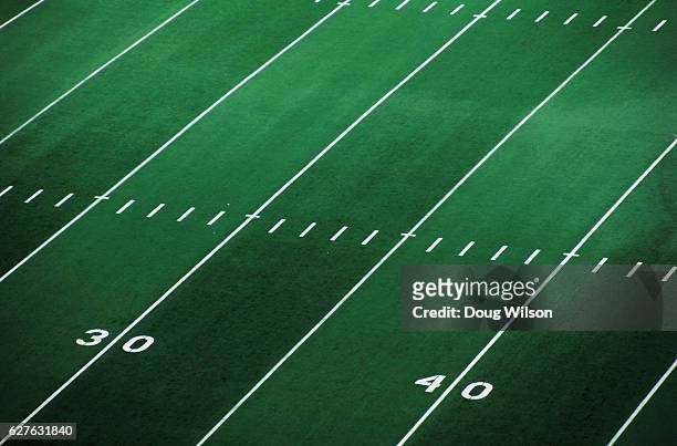 football field - american football stock pictures, royalty-free photos & images