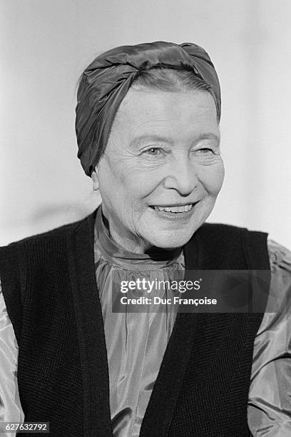 French author Simone de Beauvoir at home during a recording for the program Le Deuxiéme Sexe.