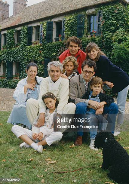 French actor Daniel Gélin surrounded by his family. His sons Xavier and Manuel , and his daughters Fiona and Laura .