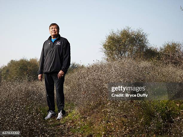 William Mervin "Billy" Mills, also known as Makata Taka Hela, is the second Native American to win an Olympic gold medal, is photographed for...