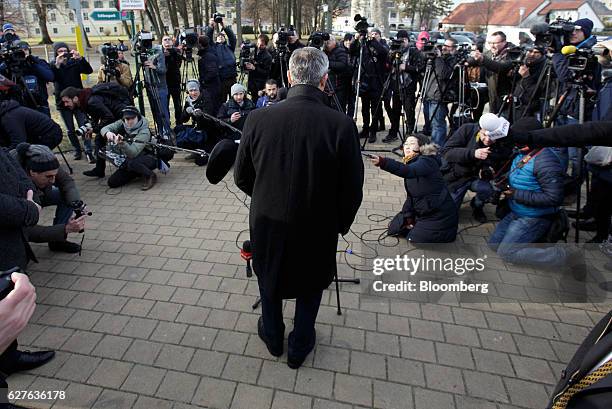 Norbert Hofer, presidential candidate of Austria's Freedom party, addresses members of the media in front of a polling station after casting his vote...