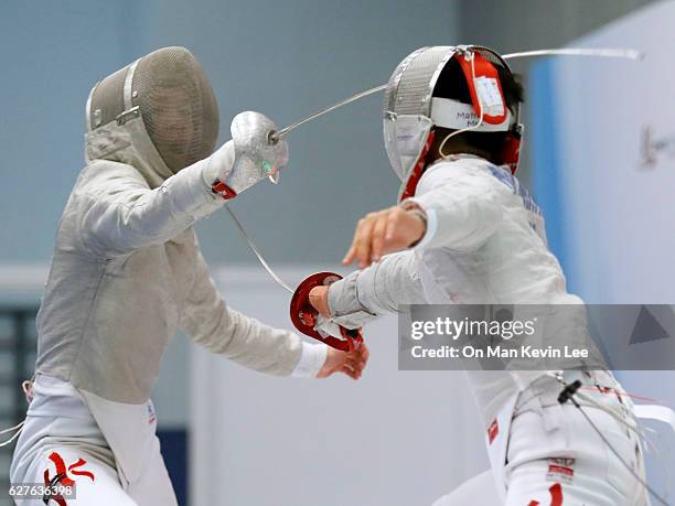 Lee Chak Fung Terence of Hong Kong fences against Matthew Mak of Hong Kong during Men's Sabre final match in 2016 Hong Kong Fencing Open...