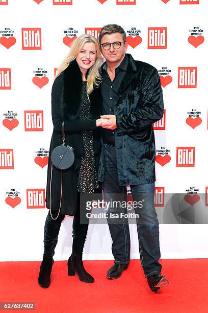 German actor Hans Sigl and Susanne Kemmler attend the Ein Herz Fuer Kinder gala on December 3, 2016 in Berlin, Germany.