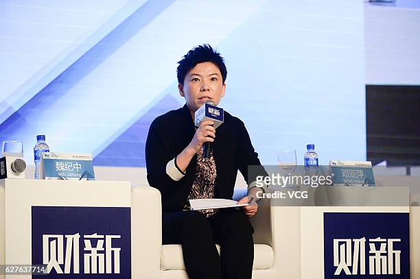 Chinese former table tennis player Deng Yaping attends The Second China Sports Industry Forum as a part of The 7th Caixin Summit on December 4, 2016...