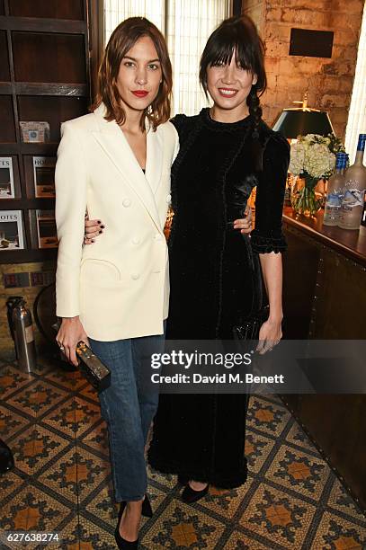 Alexa Chung and Daisy Lowe attend The Fashion Awards in partnership with Swarovski nominees' lunch hosted by the British Fashion Council with Grey...