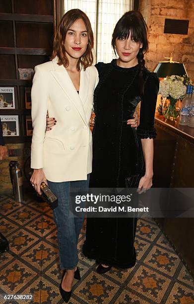 Alexa Chung and Daisy Lowe attend The Fashion Awards in partnership with Swarovski nominees' lunch hosted by the British Fashion Council with Grey...