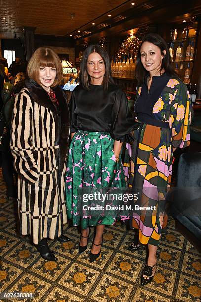Anna Wintour, Dame Natalie Massenet and Caroline Rush attend The Fashion Awards in partnership with Swarovski nominees' lunch hosted by the British...