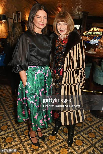 Dame Natalie Massenet and Anna Wintour attend The Fashion Awards in partnership with Swarovski nominees' lunch hosted by the British Fashion Council...