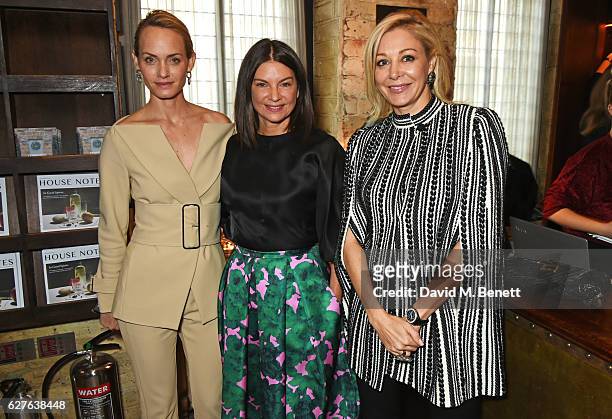 Amber Valletta, Dame Natalie Massenet and Nadja Swarovski attend The Fashion Awards in partnership with Swarovski nominees' lunch hosted by the...