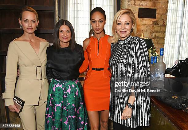 Amber Valletta, Dame Natalie Massenet, Joan Smalls and Nadja Swarovski attend The Fashion Awards in partnership with Swarovski nominees' lunch hosted...