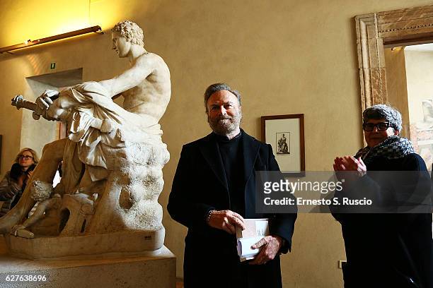 Franco Nero and Alessandra Capodiferro attend the Songs Of Stone' By Gabriele Tinti at Museo Nazionale Romano Palazzo Altemps on December 4, 2016 in...