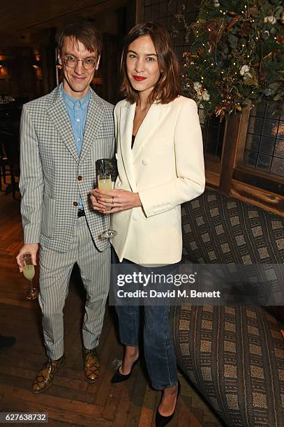 Michael Pegrum and Alexa Chung attend The Fashion Awards in partnership with Swarovski nominees' lunch hosted by the British Fashion Council with...