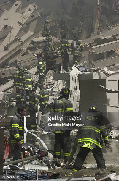 Firefighters search for survivors after the collapse of the World Trade Center on Sept. 11, 2001.