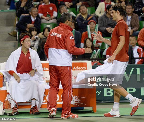 Japan - Frank Dancevic of Canada retires from a Davis Cup World Group first-round match against Japanese ace Kei Nishikori at Ariake Colosseum in...