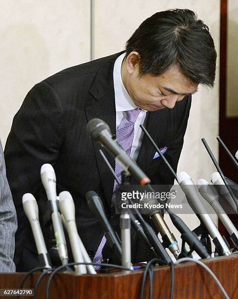 Japan - Osaka Mayor Toru Hashimoto, who is also co-head of the opposition Japan Restoration Party, bows during a press conference in Osaka on Feb. 3,...