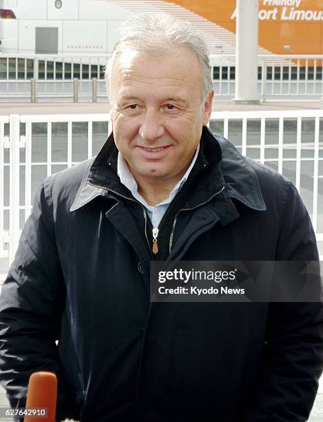 Japan - Japan's national men's soccer team manager Alberto Zaccheroni speaks with reporters after arriving at Narita airport near Tokyo on Feb. 3,...