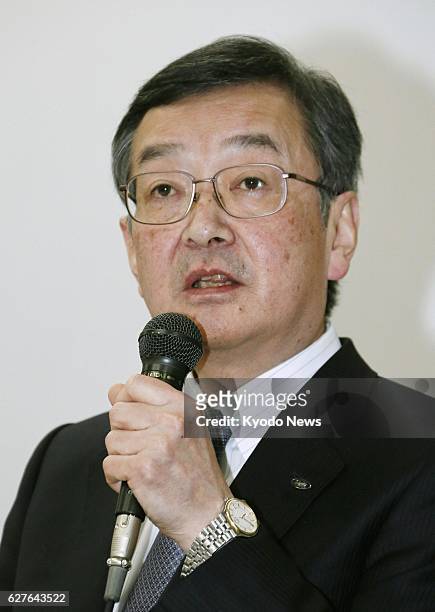 Japan - Kozo Takahashi, president of Sharp Corp., answers a reporter's question after releasing the company's earnings results for the nine months to...