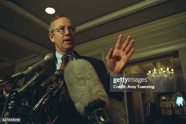 American lawyer and judge Kenneth Starr resigns after Whitewater scandal.