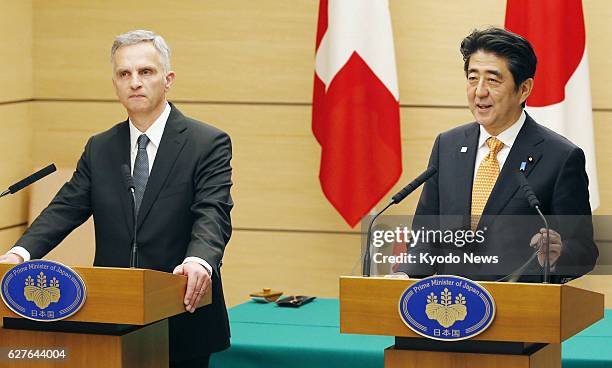 Japan - Swiss President Didier Burkhalter and Japanese Prime Minister Shinzo Abe attend a joint news conference at the prime minister's office in...