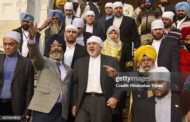 Iranian Foreign Minister Mohammad Javad Zarif and his wife Maryam Imanieh with delegation members paying obeisance at Golden Temple, on December 4,...