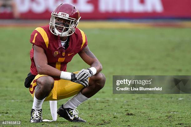 Darreus Rogers of the USC Trojans rests on the field during the game against the Notre Dame Fighting Irish at Los Angeles Memorial Coliseum on...