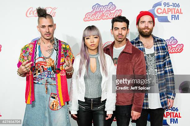 Cole Whitte, JinJoo Lee, Joe Jonas and Jack Lawless from DNCE attend Capital's Jingle Bell Ball with Coca-Cola on December 4, 2016 in London, United...