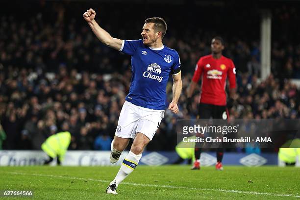 Leighton Baines of Everton celebrates scoring an equalising goal from a penalty to make the score 1-1 during the Premier League match between Everton...