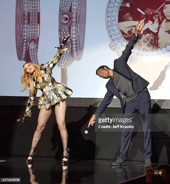 Madonna and Chris Rock on stage during her Evening of Music, Art, Mischief and Performance to Benefit Raising Malawi at Faena Forum on December 2,...