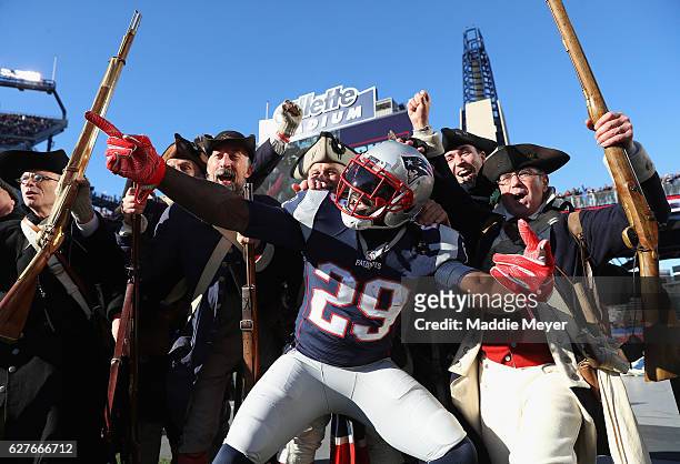 LeGarrette Blount of the New England Patriots celebrates scoring a touchdown during the first quarter against the Los Angeles Rams at Gillette...