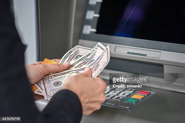 cashpoint-maschine - 50 dollar bill stock-fotos und bilder
