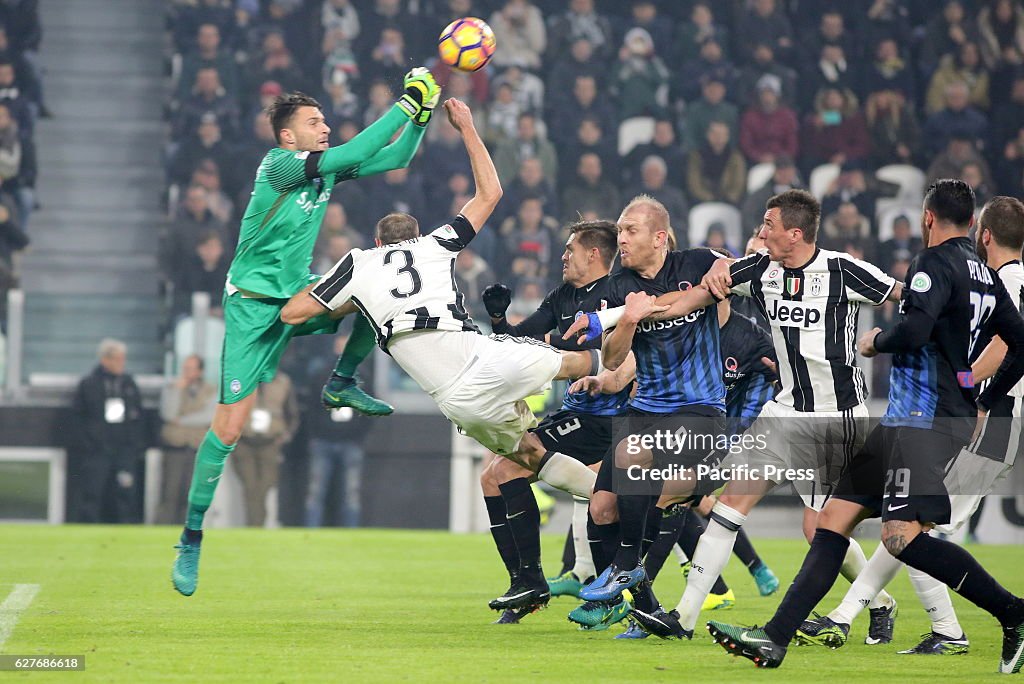 Marco Sportiello of Atalanta (left) and Giorgio Chiellini of...