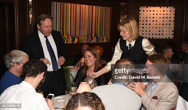 Jemma Redgrave and Neil Dudgeon serve diners during One Night Only at The Ivy in aid of Acting for Others at The Ivy on December 4, 2016 in London,...