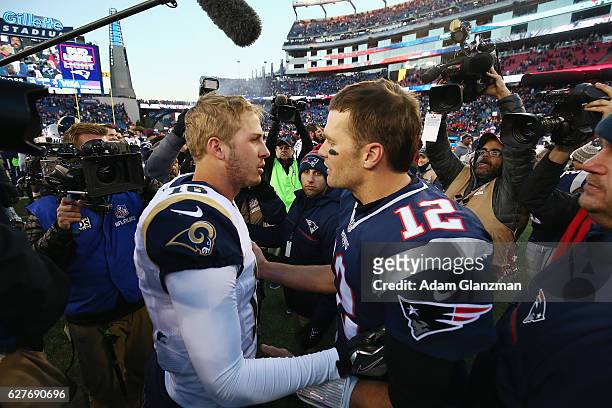 Jared Goff of the Los Angeles Rams greets Tom Brady of the New England Patriots after the New England Patriots defeated the Los Angeles Rams 26-10 at...