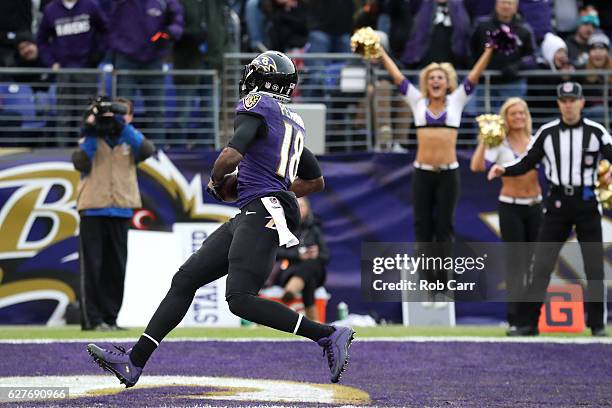 Wide receiver Breshad Perriman of the Baltimore Ravens scores a fourth quarter touchdown against the Miami Dolphins at M&T Bank Stadium on December...