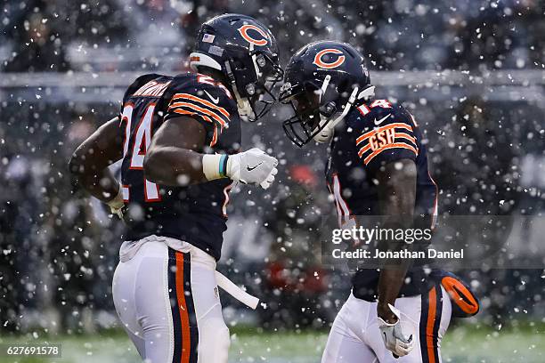 Jordan Howard and Deonte Thompson of the Chicago Bears react after Howard scored in the third quarter against the San Francisco 49ers at Soldier...