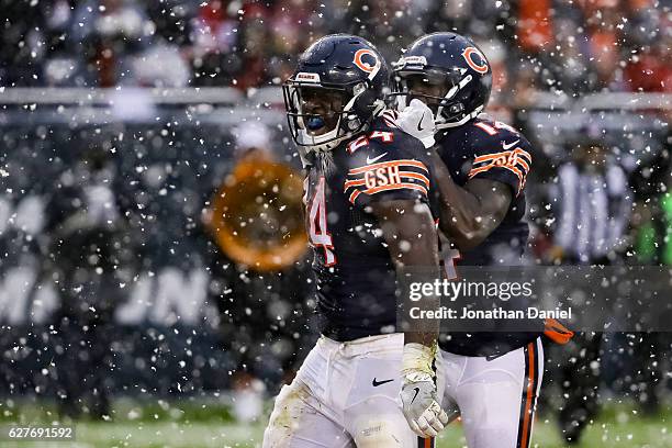 Jordan Howard and Deonte Thompson of the Chicago Bears react after Howard scored in the third quarter against the San Francisco 49ers at Soldier...