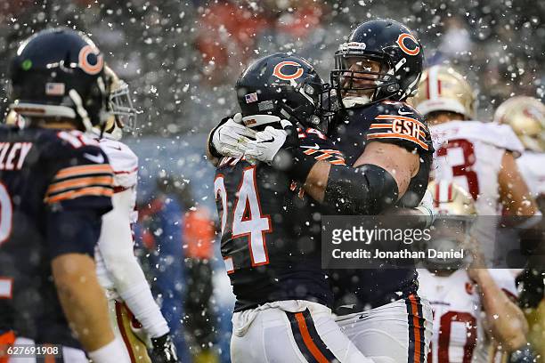 Jordan Howard and Logan Paulsen of the Chicago Bears react after Howard scored in the third quarter against the San Francisco 49ers at Soldier Field...