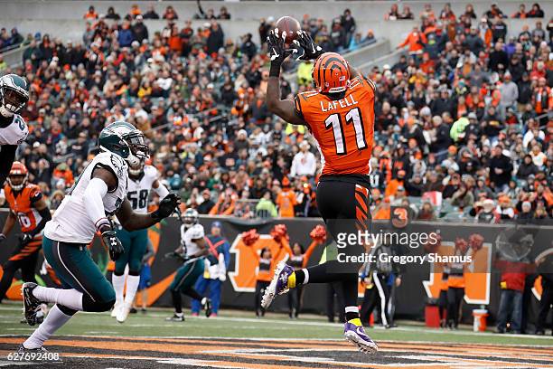 Brandon LaFell of the Cincinnati Bengals catches a pass for a touchdown over the defense of Malcolm Jenkins of the Philadelphia Eagles during the...