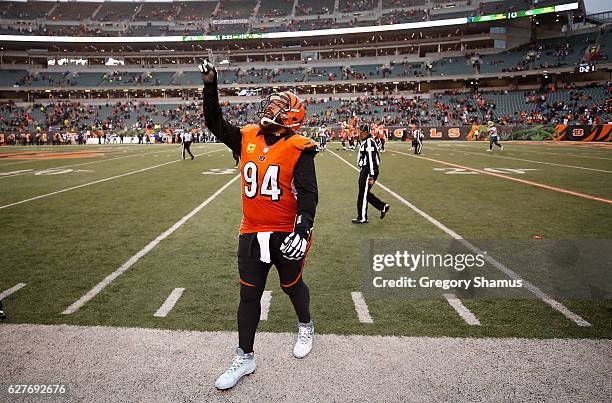 Domata Peko of the Cincinnati Bengals celebrates as he walks off of the field after defeating the Philadelphia Eagles 32-14 at Paul Brown Stadium on...