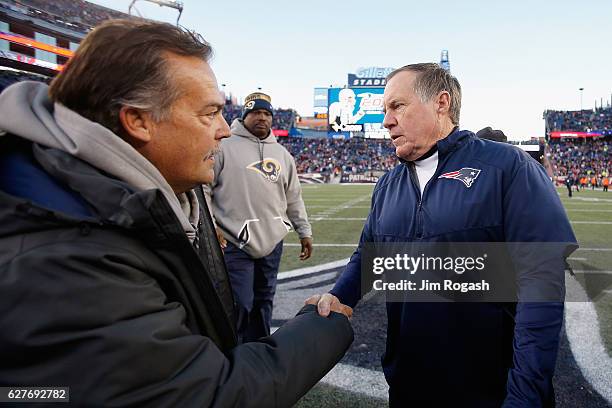 Head coach Jeff Fisher of the Los Angeles Rams shakes hands with head coach Bill Belichick of the New England Patriots after the Patriots defeated...