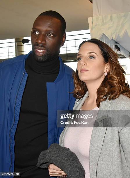 Omar Sy and his wife Helene Sy attend 'Norm' Paris Premiere at Mk2 Bibliotheque on December 4, 2016 in Paris, France.