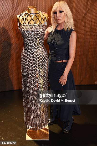 Donatella Versace presents 'Versace' book talk in conversation with Tim Blanks at The V&A on December 4, 2016 in London, England.